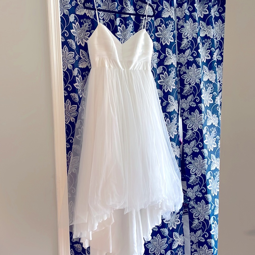 Wedding gown. High (tea length in front - low to ground in back